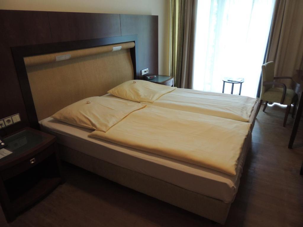 Royal Inn Colonia Habitación foto